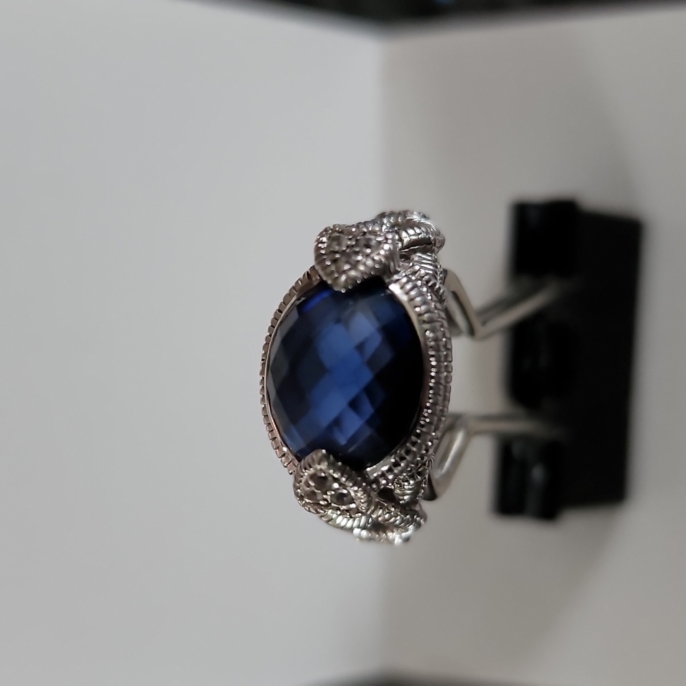 Judith Ripka blue stone ring with white saphire heart accent.